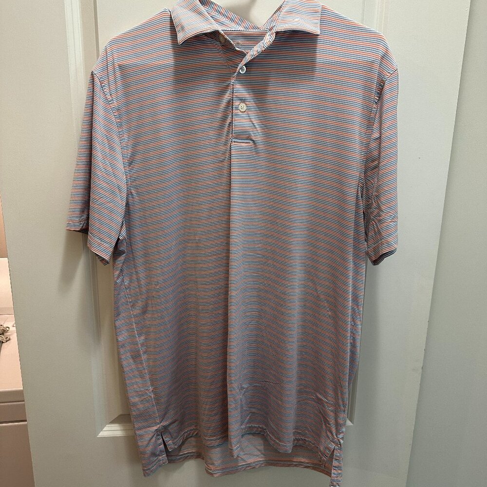 Southern Tide men's striped performance polo shirt in orange and blue